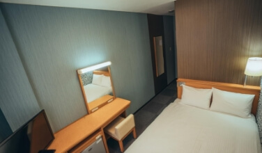 ECONOMY SEMI-DOUBLE ROOM